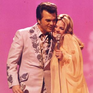 Conway Twitty and his daughter Joni performing their song, "Don't Cry Joni" on the 1975 CMA Awards Show.