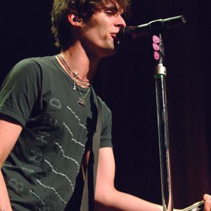 Tyson Ritter sings and plays the bass on stage with the All-American Rejects, an award-winning rock band that formed in Stillwater.