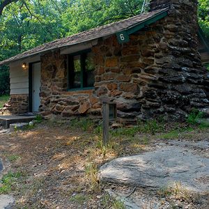 The historic cabins at Greenleaf State Park were built by the Civilian Conservation Corps and the Works Progress Administration during the 1930s. Here, the native stone architecture of cabin #6 is highlighted.