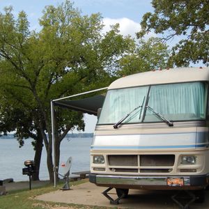 Set up your camper next to Grand Lake at Cherokee Park-Lakeside.