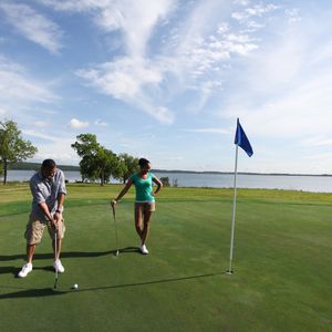 Ultradwarf Bermuda grass greens and well placed sand bunkers await you at this 5,860-yard golf course.