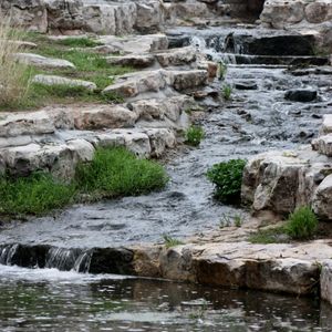 A serene stream cascades through the park. Photo by Deby Snodgrass.