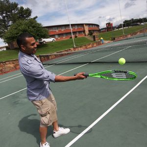 Play a hard-hitting round of tennis at Sequoyah Bay State Park. Photo by Rebekah Morrow.