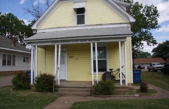 Garth Brooks lived in this yellow house in Stillwater while attending Oklahoma State University. 