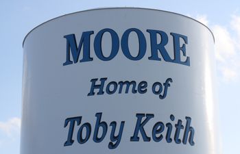 Visitors to Toby Keith's hometown, Moore, are welcomed with a water tower honoring the singer.