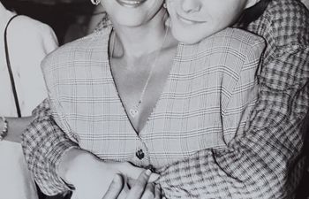 Bryan White with his mother at the celebration for his first #1 hit "Someone Else's Star" in Nashville in 1995