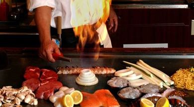 Watch as a chef entertains you while preparing your meal at Sakura's Hibachi grill in Altus.
