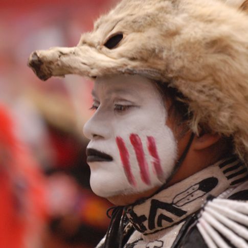 Oklahoman John Keel, a member of the Comanche tribe, concentrates as he prepares to compete in the Traditional Dance competition at the Red Earth Native American Cultural Festival.
