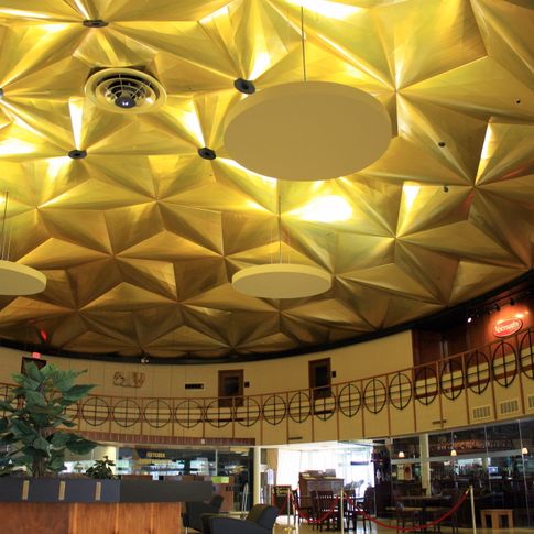 Oklahoma City's iconic Gold Dome is a geodesic marvel inspired by the designs of renowned architect Buckminster Fuller and is considered to be one of the best examples of its type of architecture in the nation. 