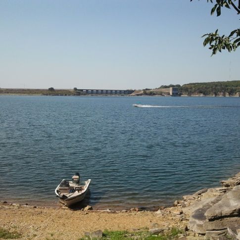 Cabins 23 and 24 at Tenkiller State Park lead down to a private swimming beach, which is also a great place to dock your boat.