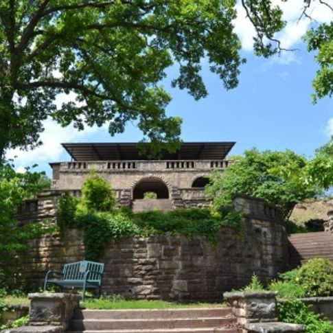 The Pawnee Bathhouse & Recreation Area is a 1939 WPA sandstone structure that overlooks a two acre fresh water pool with a sandy beach, water slide, high dive, water trampoline and paddle boats.