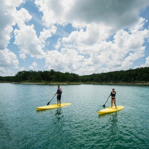Paddleboarding on the waters at Lake Murray State Park.