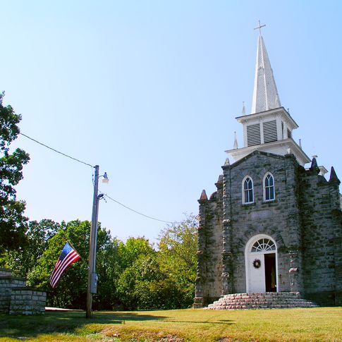 The Cayuga Mission Church was commissioned by Mathias Splitlog and completed in 1896.