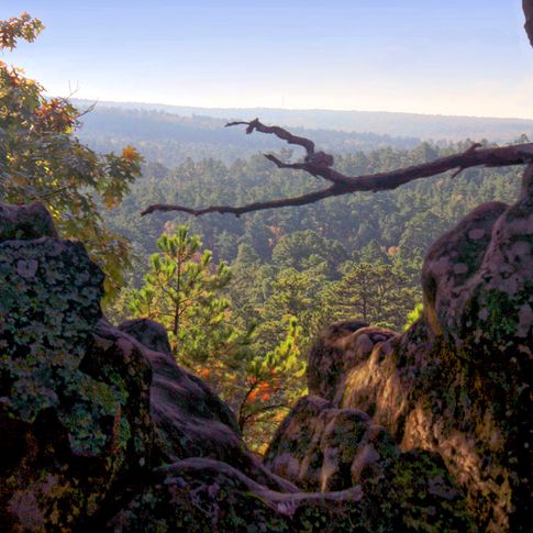 The beauty of the Sans Bois Mountains is captured from an overlook at Robbers Cave State Park in Wilburton.  The park offers a lodge, historic cabins, camping, hiking, Lake Carlton with swim beach and canoe rentals, rock climbing, horseback riding, and a nature center.