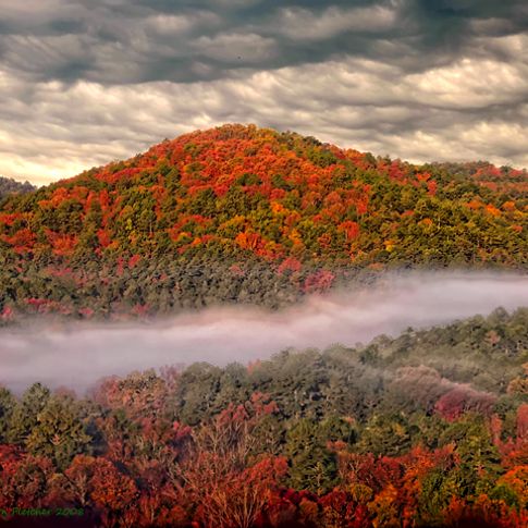 Mist enshrouds the hills of Beavers Bend State Park in Broken Bow creating spectacular scenery on a fall day.