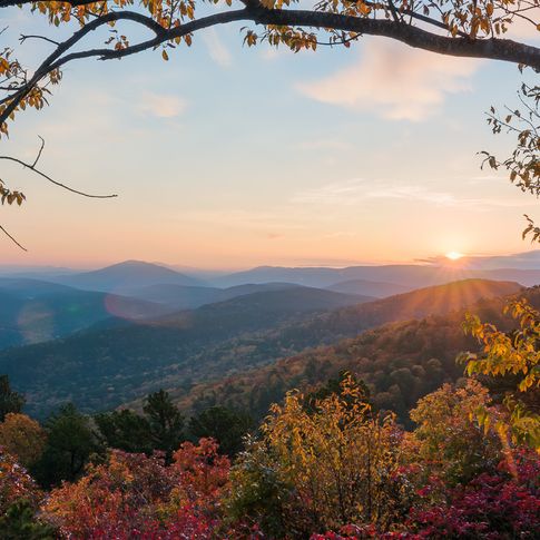 The sun setting over the Ouachita Mountains is a beautiful sight for travelers on the Talimena National Scenic Byway in southeast Oklahoma.
