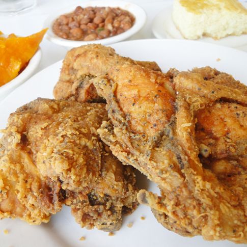 Evelyn&#039;s Soul Food in Tulsa features delicious fried chicken alongside famous sides like collard greens, sweet yams and macaroni and cheese.