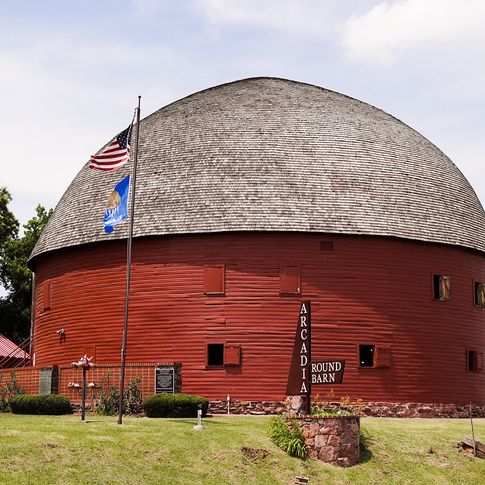 Built by local farmer William Harrison Odor in 1898 using native bur oak boards, the Round Barn in Arcadia is one of the most-photographed attractions along Route 66.