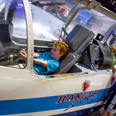 Let the kids experience flight simulators at the Tulsa Air and Space Museum &amp; Planetarium.