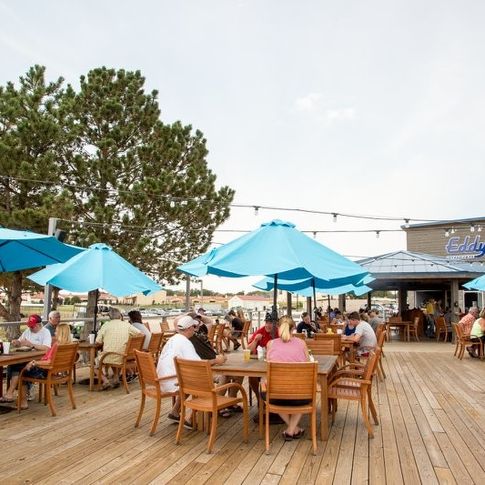 Eddy&#039;s Lakeside Bar is one of many options for outdoor dining at the Shangri-La Golf Club, Resort &amp; Marina on Grand Lake.