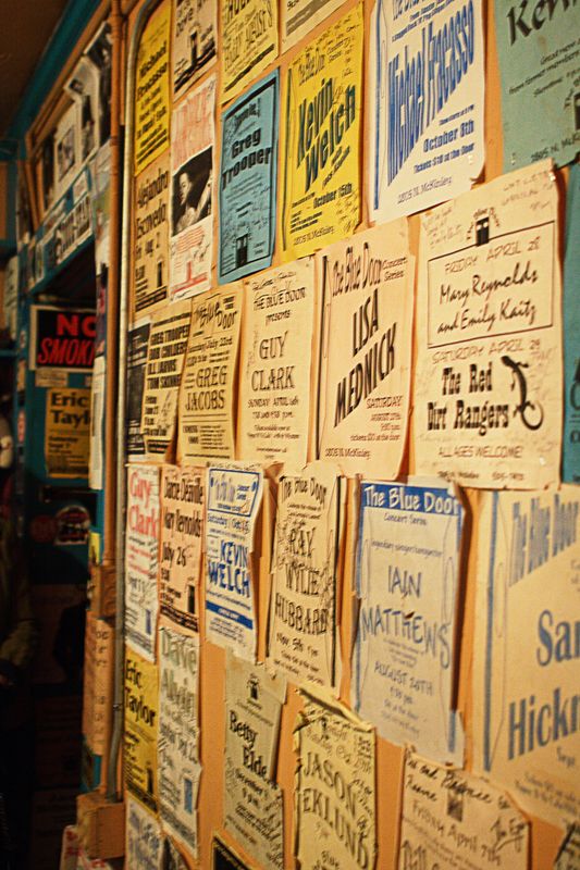 Music posters cover the walls at The Blue Door in Oklahoma City.