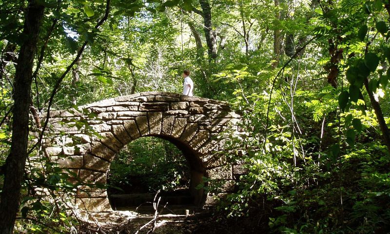 The hiking trails at the Chickasaw National Recreation Area in Sulphur pass through a forest thick with oak, maple, sweetgum and hickory.