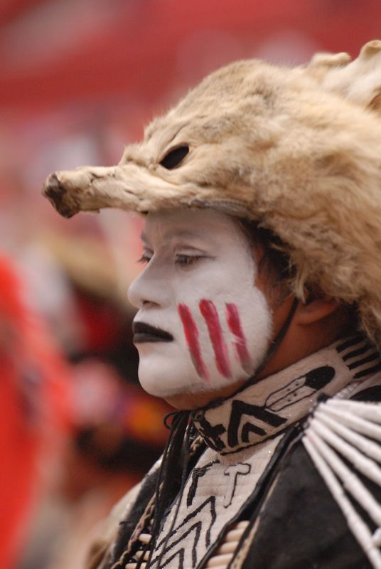 Oklahoman John Keel, a member of the Comanche tribe, concentrates as he prepares to compete in the Traditional Dance competition at the Red Earth Native American Cultural Festival.