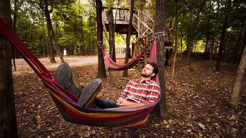Kick back and relax during your retreat at Eufaula's Treehouse Tree-Sort.