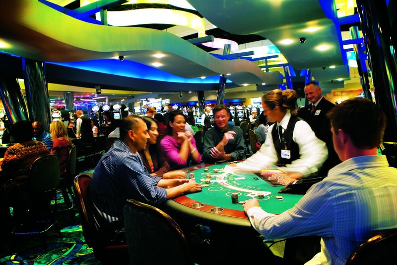 Table games including poker and blackjack keep Riverwind Casino guests entertained 24 hours a day.
