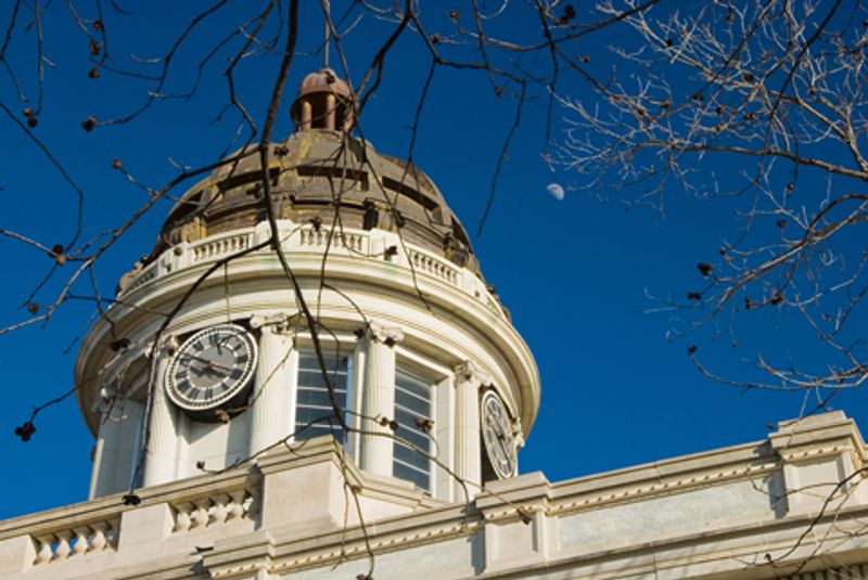 The Carter County Courthouse in Ardmore was designed and constructed in 1910 with a rich combination of architectural elements. The courthouse combines Neoclassical architecture with colossal Doric columns, Classical detailing and Ionic columns on the dome.