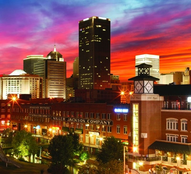 The view from the Bricktown Entertainment District is magnificent as the Oklahoma City skyline is drenched in the spectacular colors of an Oklahoma sunset.