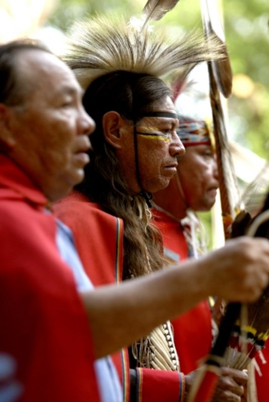 Members of the Kiowa Black Leggings Warrior Society take part in a ceremony to honor veterans.  The public is invited to attend the annual event in Anadarko which includes two days of traditional dancing and ceremonial festivities.