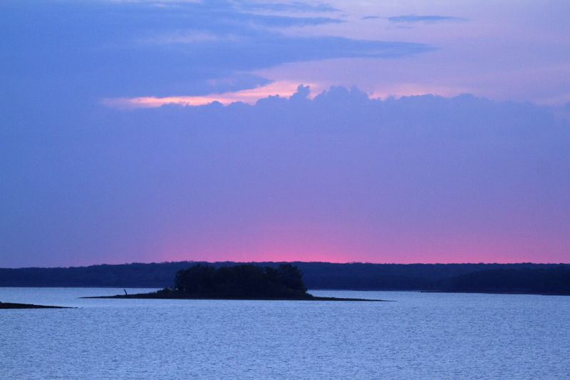 An amazing pastel glow lights up the Twin Bridges area of Lake Thunderbird in Norman at sunrise.
