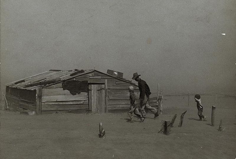 A dust storm ravages an Oklahoma farm during the Dust Bowl in 1936.