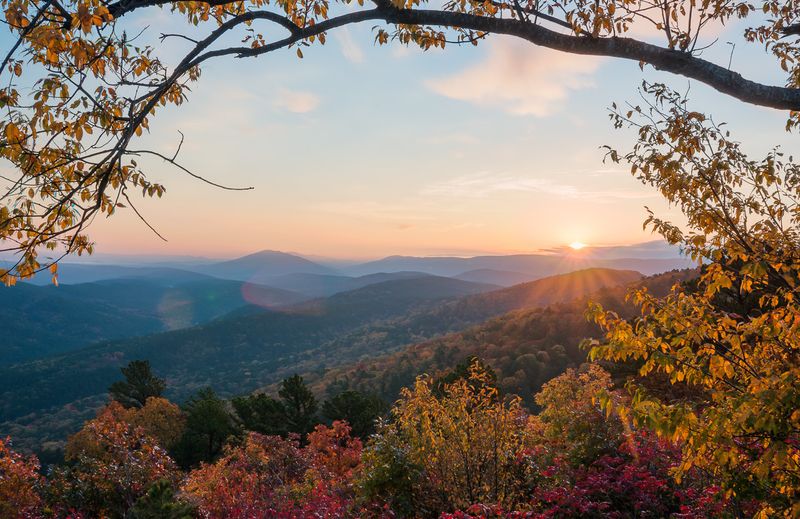 The sun setting over the Ouachita Mountains is a beautiful sight for travelers on the Talimena National Scenic Byway in southeast Oklahoma.