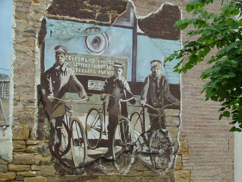 Palmer Studios added this Muskogee Postcard Mural to a local business building in 2001.