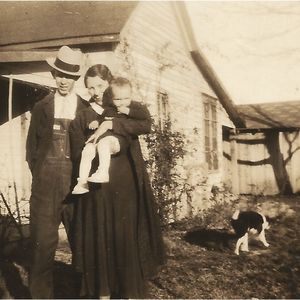 Albert Brumley and his wife Goldie with their first born son, Bill, in 1934