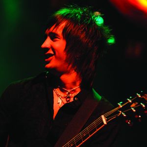 All-American Rejects lead guitarist Nick Wheeler plays with the band at a live show. 