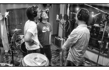 The Hanson brothers sing together in their Tulsa recording studio, 3CG, which is short for Three Car Garage, in 2006.