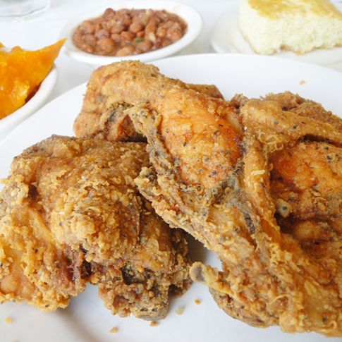 Evelyn's Soul Food in Tulsa features delicious fried chicken alongside famous sides like collard greens, sweet yams and macaroni and cheese.