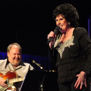 The Queen of Rockabilly, Wanda Jackson, performing with Terry Scarberry and the Oklahoma Opry band in 2013.