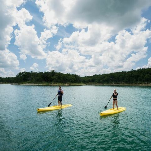Paddleboarding on the waters at Lake Murray State Park.