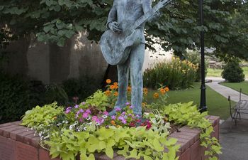 Woody Guthrie statue located in downtown Okemah, Oklahoma