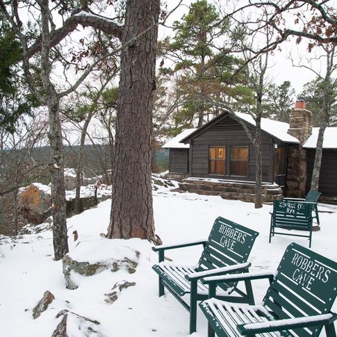 A pair of chairs, perfect for sharing a wintry view of Robbers Cave State Park with someone special.