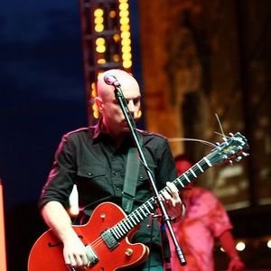 Trent Bell playing guitar during the Chainsaw Kittens performance at the first annual Norman Music Festival in 2008