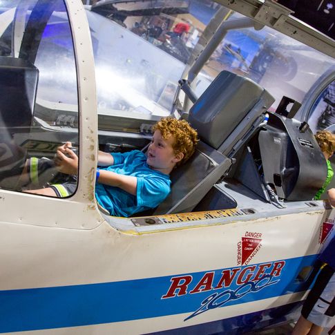 Let the kids experience flight simulators at the Tulsa Air and Space Museum & Planetarium.