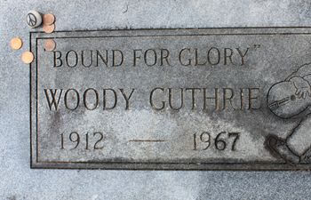 A memorial marker for Woody Guthrie, who is not actually buried here, at Highland Cemetery in Okemah.