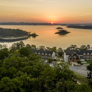 A stay at Lakeview Lodge in Beavers Bend State Park is perfect for catching Oklahoma sunsets paint the rolling hills surrounding Broken Bow Lake in golden shades of orange and purple.  Photo by Shane Bevel.