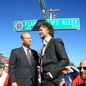 The Flaming Lips lead singer Wayne Coyne with Mayor Mick Cornett at the ceremony for the naming of the street Flaming Lips Alley in Oklahoma City.