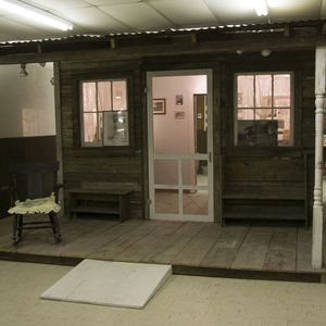 A replica of the London House, where Woody Guthrie spent his youth, was built using the original wood from the home. 
